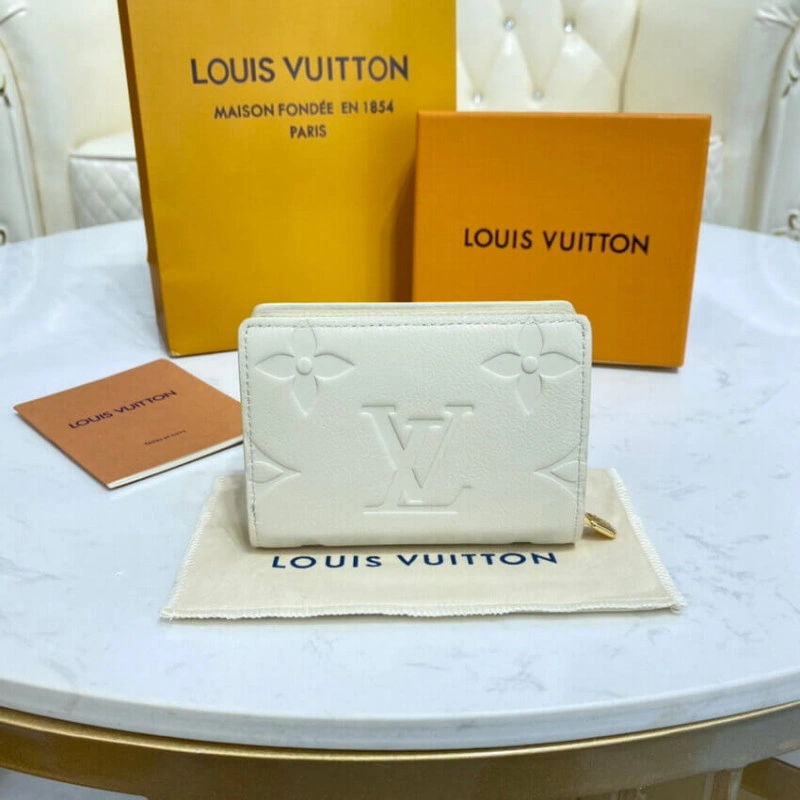 Inside ca Louis Vuitton Clea Wallet Creme - Image 3